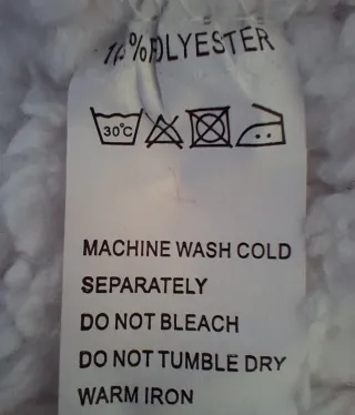 Coperta/poncho con cappuccio indossabile