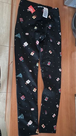 Mallas negras de niña con estampado de regalos