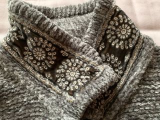 Giacca grigia con dettagli