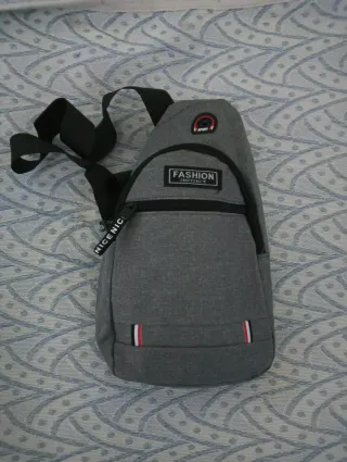 Bolso bandolera gris hombre