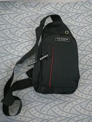 Bolso bandolera gris hombre