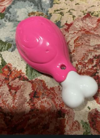 Dentina dinosauro rosa giocattolo