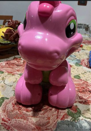 Dentina dinosauro rosa giocattolo