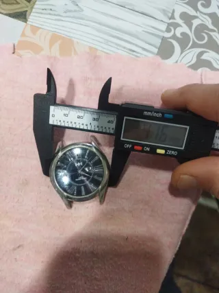 Reloj HHI Negro y Plateado