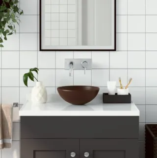 Lavabo redondo sobre encimera