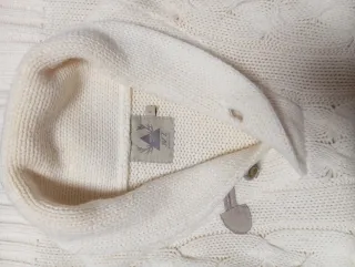 Jersey de punto blanco con trenzas