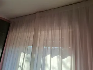 Tende camera da letto bianche