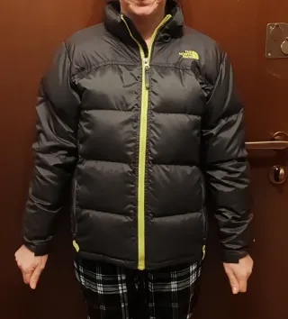 The North Face piumino nero con zip gialla