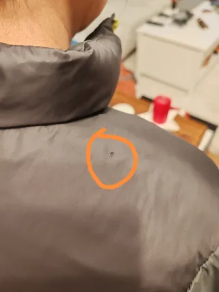 The North Face piumino nero con zip gialla