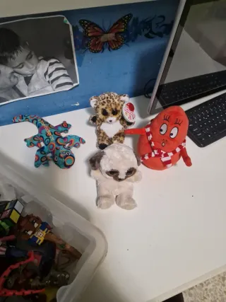 Lotto di peluche: cane, leopardo, polpo, lucertola