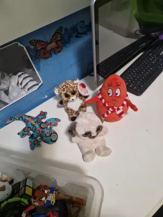 Lotto di peluche: cane, leopardo, polpo, lucertola