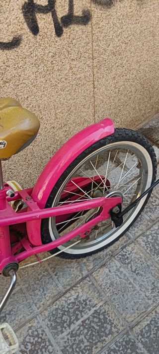 Bicicleta rosa infantil