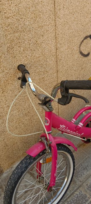 Bicicleta rosa infantil