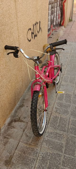 Bicicleta rosa infantil