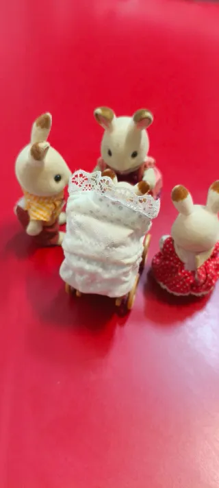 Familia Sylvanian Families con carrito