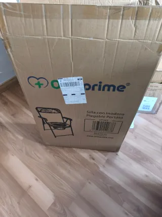 Silla orinal ortopédica azul sin usar