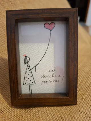 Cornice con disegno bambina e palloncino