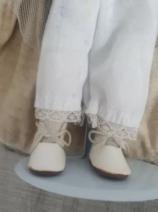 Muñeca de porcelana antigua