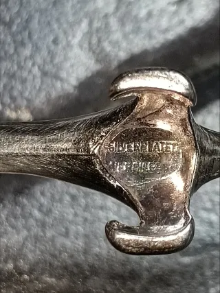 12 pezzi tra monete e antichità