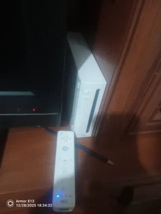 Consola Wii con mando y juegos