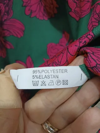 Blusa donna verde e rosa floreale.