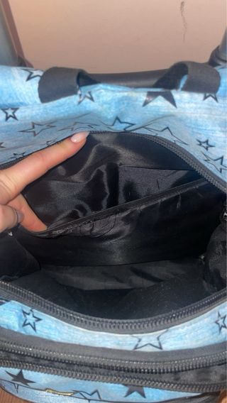 Mochila con ruedas y diseño de estrellas