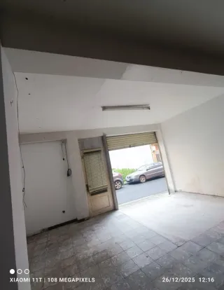 Bajo con derecho a vivienda o oficina y garaje