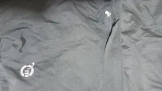 Chaleco Cortavientos Negro y Amarillo