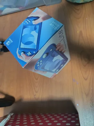 Scatola Nintendo Switch Lite Blu e Turchese