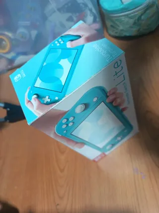 Scatola Nintendo Switch Lite Blu e Turchese