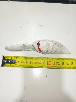 Señuelo de pesca blanco con brillos