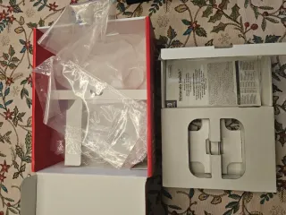 Nintendo Switch OLED en su caja original