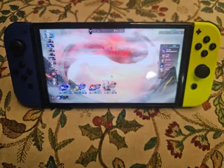 Nintendo Switch OLED en su caja original