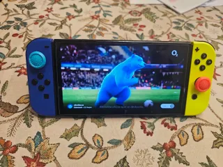 Nintendo Switch OLED en su caja original