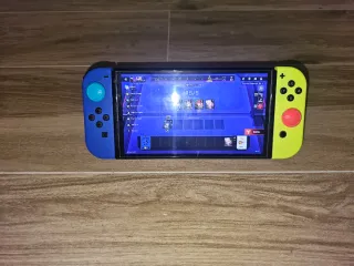 Nintendo Switch OLED en su caja original