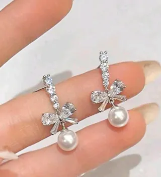 Pendientes de lazo con perla y circonitas sintétic