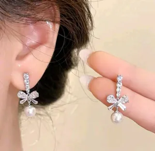 Pendientes de lazo con perla y circonitas sintétic