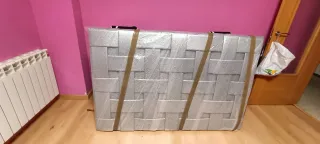 Cabecero tapizado en polipiel gris plata trenzado