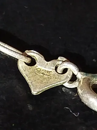 Colgante plata 925 con cadena y sonajero.