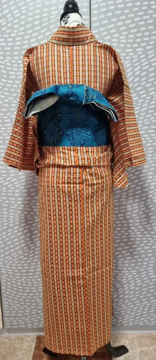 Kimono de lana naranja, turquesa y negro