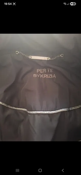 Cappotto trapuntato nero con cappuccio