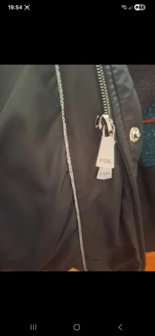 Cappotto trapuntato nero con cappuccio