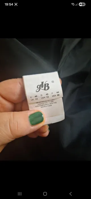 Cappotto trapuntato nero con cappuccio