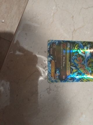 Carta Pokémon M Charizard EX Es una 69/106