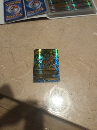 Carta Pokémon M Charizard EX Es una 69/106