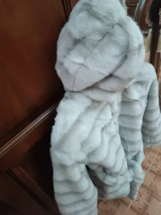 Pelliccia sintetica con cintura