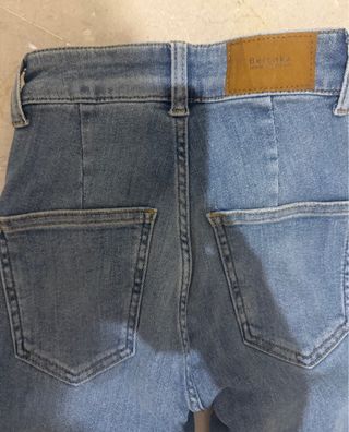 Pantalón vaquero desgastado mujer