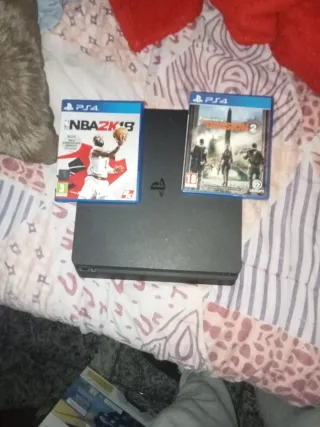 PS4 (Playstation 4) + 2 Juegos