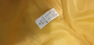 Piumino donna giallo con cappuccio