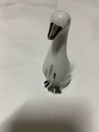 Figura de pato de cerámica